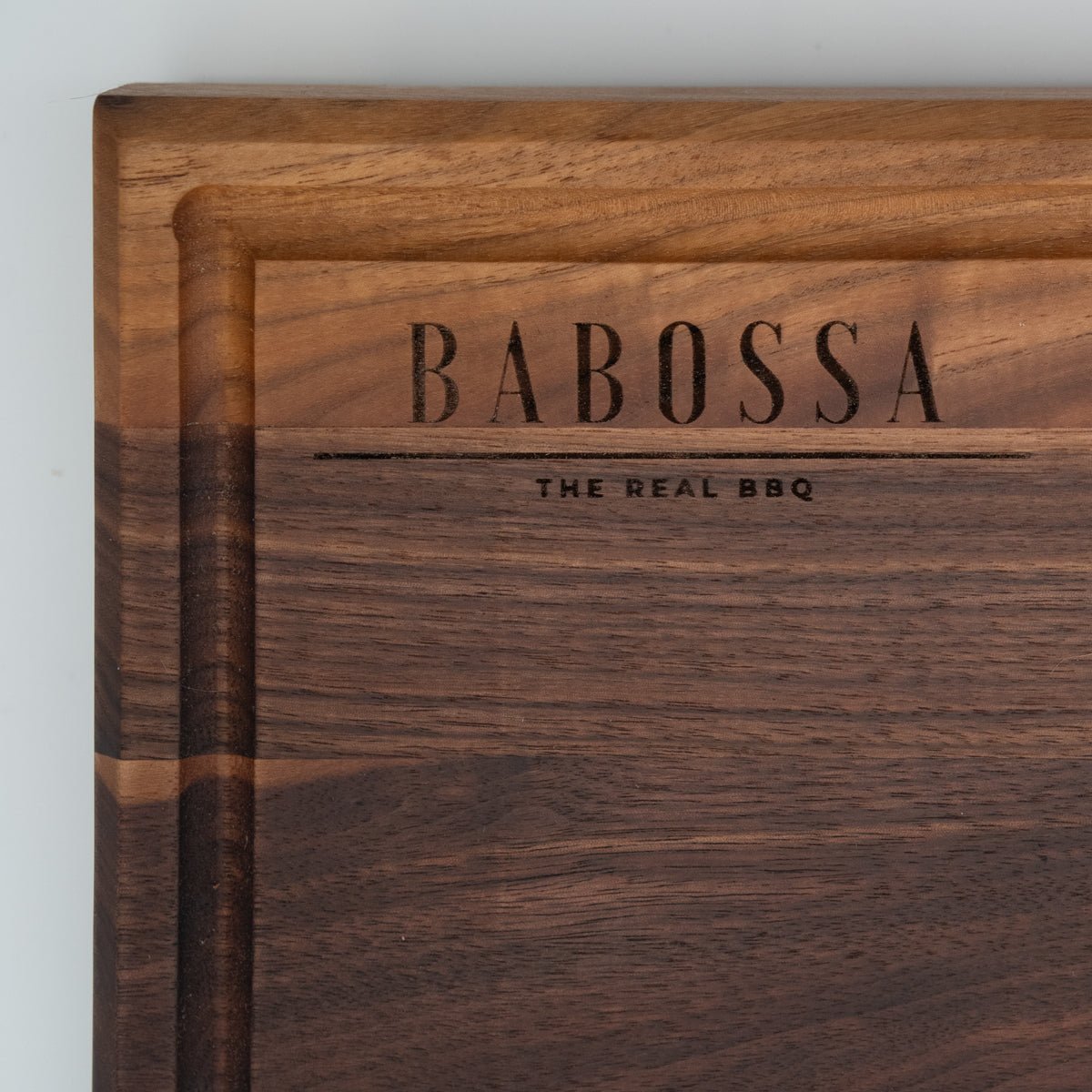 BABOSSA | Nussbaum Schneidebrett XL | Naturkante | Saftrille | 70x40x6 cm - BABOSSABABOSSA | Nussbaum Schneidebrett XL | Naturkante | Saftrille | 70x40x6 cmHolzbrettBABOSSABABOSSA